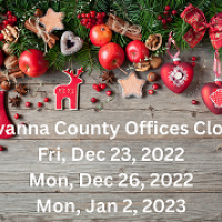 christmas ornaments with text alerting residents to holiday closures of County Offices