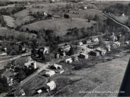 a 1964 aerial photo of the village of palmyra