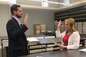 photo of E Dahl swearing in as County Administrator