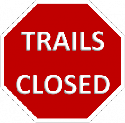 red hexagon with the words trails closed